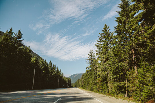 an empty straight highway in Canada.