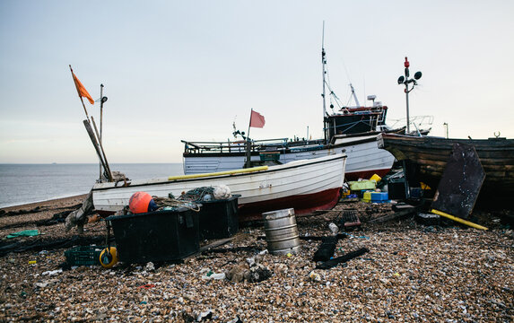 Fishing boat on an empty beach, Kent, UK.