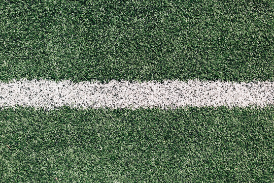 White line on grass sports field