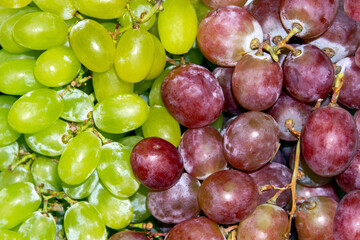close-up of fresh green and red grapes 