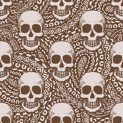 Seamless pattern with hand drawn skulls. Vector Illustration