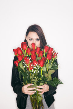 Valentine: Mysterious Woman Holds Two Dozen Roses