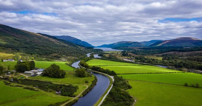 aerial drone footage of summer in gairlochy near fort william on the caledonian canal in the argyll region of the highlands of scotland showing the mountains of glencoe and the surrounding region