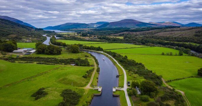 aerial drone footage of summer in gairlochy near fort william on the caledonian canal in the argyll region of the highlands of scotland showing the mountains of glencoe and the surrounding region