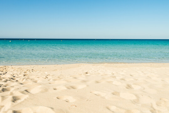 looking into the ocean from the sand, nobody.