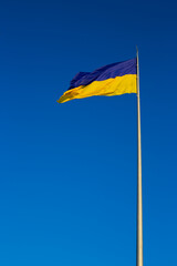 National flag of independent Ukraine waving in the wind