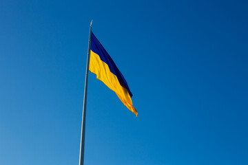 National flag of independent Ukraine waving in the wind