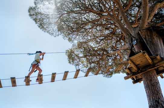 Little girl in an adventure park