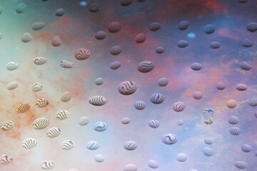 intricate patterns of water droplets on the display glass