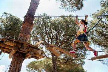Little girl in an adventure park