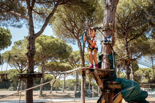 Little girl in an adventure park