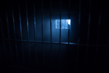 Jail or prison cell. Old grunge prison miniature. Dark prison interior creative decoration. Empty...