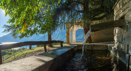 Naklejka na ściany i meble Santa Giulia Oratory. Panorama on Lake Lugano. Intelvi Valley. Como. Lombardy. Italy.