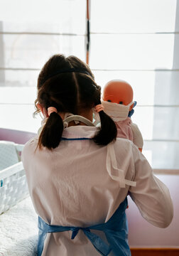 Little girl playing at home