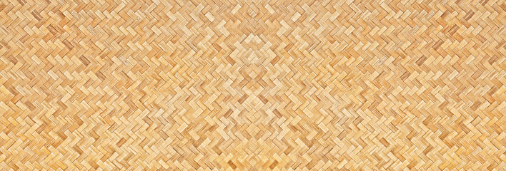 Traditional handcraft woven bamboo texture for banner, weave wood pattern background.