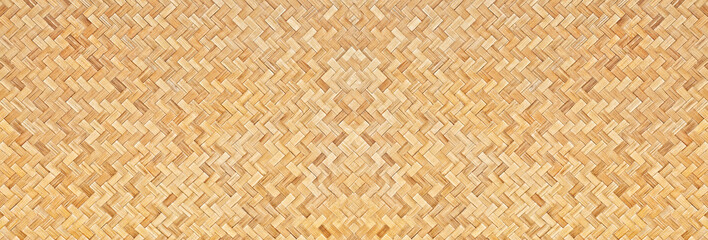 Traditional handcraft woven bamboo texture for banner, weave wood pattern background.