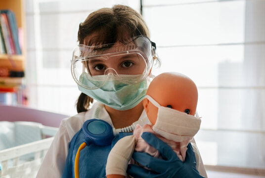 Little girl playing at home
