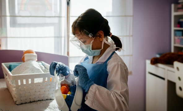 Little girl playing at home