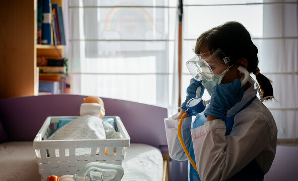 Little girl playing at home
