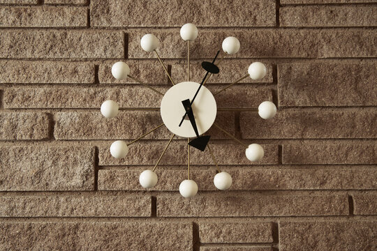 Vintage Clock On A Wall Inside A Mid Century Modern Home.