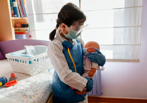 Little girl playing at home