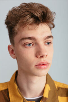 Young Guy wearing a yellow jacket