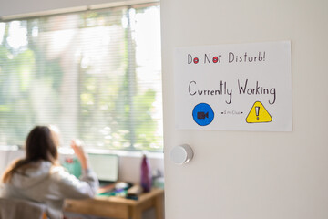 handmade sign on bedroom door