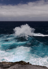 North coast of Gran Canaria, Canary Islands, Banaderos area, strangely shaped wave, resembling underwater explosion, 
formed by a clash of incoming and reflected waves