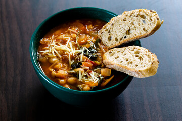 Homemade Ribollita, tuscan bean soup with light rye ciabatta