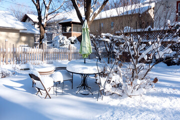 Outdoor patio covered with snow waiting for summer. St Paul Minnesota MN USA