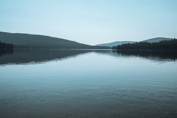 Fototapeta na wymiar The Thompson Chain of Lakes area in Northern Montana on a calm morning