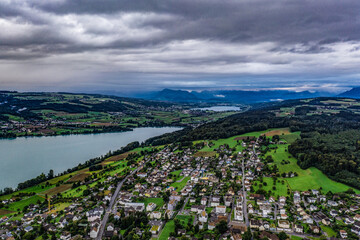 Aerial view of lake with alpine panorama