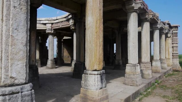 Young guy exploring world heritage Kabutar khana Pavilion also known as khajuri mosque