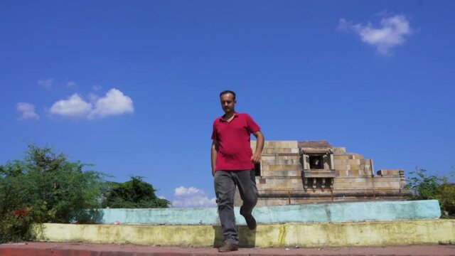 man at Vadatalav lake. man enjoying nature and pavagadh mountain