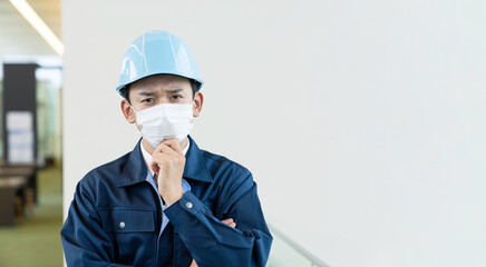 マスクを着用した作業員　感染症対策