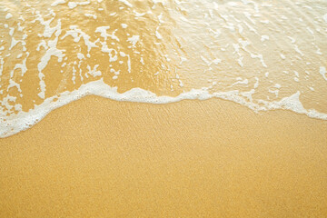 Fototapeta na wymiar Ocean wave on sandy beach. Travel concept