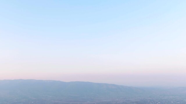 Aerial view of the city with drone from the top of Skopje Vodno. 4K. Macedonia.