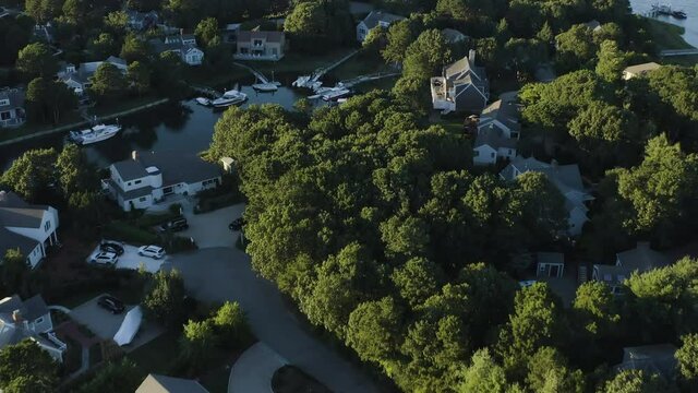 Gorgeous secluded residency with homes on the marina in Cape Cod. Aerial view