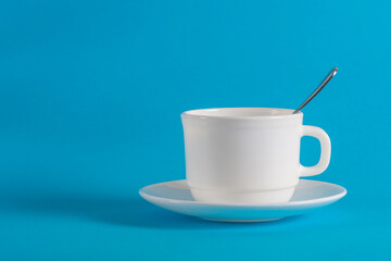 white Cup with a spoon