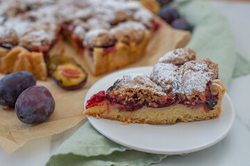 sweet home made plum crumble pie on a table