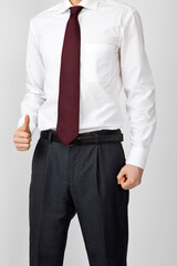 torso of businessman with thumb up