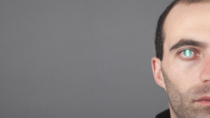 Caucasian man with a dollar symbol in his eye. Space for your text