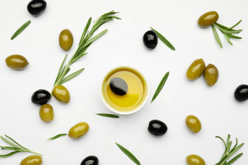 Composition with bowl of olive oil on white background