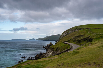 Fototapeta na wymiar Road to Coumeenoole Beach on Slea Head Drive, Scenic Dingle peninsula landscape on the west coast of Ireland