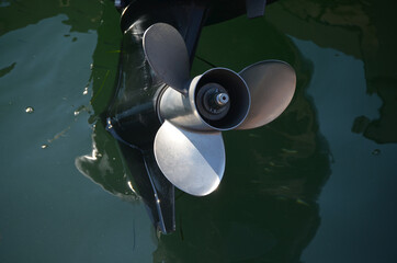 
propeller of a motorboat out of the water