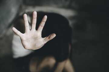 Women use their hands to protect themselves from sexual abuse.Detain rape, sexual abuse , human...