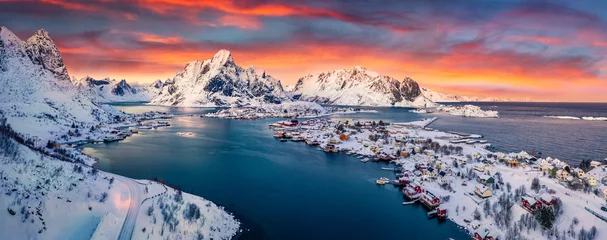 Fotobehang Lofoten Panoramic evening view from flying drone of popular tourist destination - Reine town. Amazing sunset on Lofoten Islands, Norway,. Colorful winter seascape of Norwegian sea. Life over polar circle..