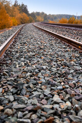 Close-up of stones on railroad tracks