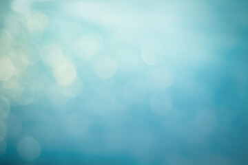 Surface of blue swimming pool background of water in swimming pool. Simulate natural wave ocean water texture summer or abstract blue sea water with white foam blank for copy space, Nature concept.