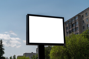 Billboard with white isolated space for advertising and posters on city street.
